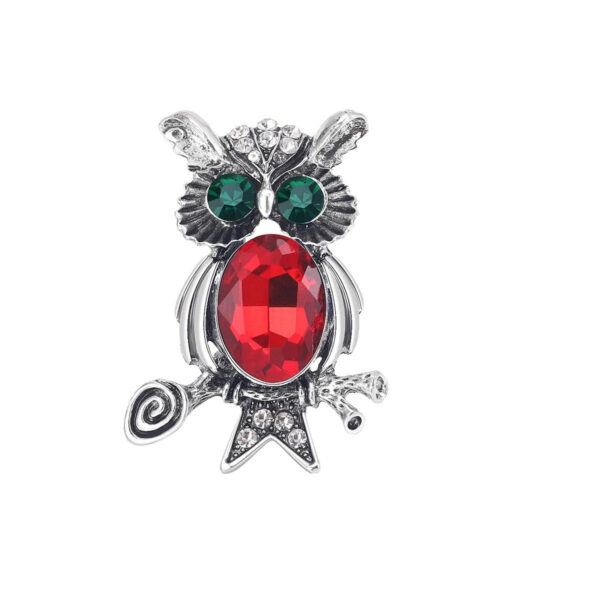 image_157 Broche met groene uilenogen