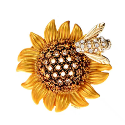 image_177 Broche bij zonnebloem goudkleurig