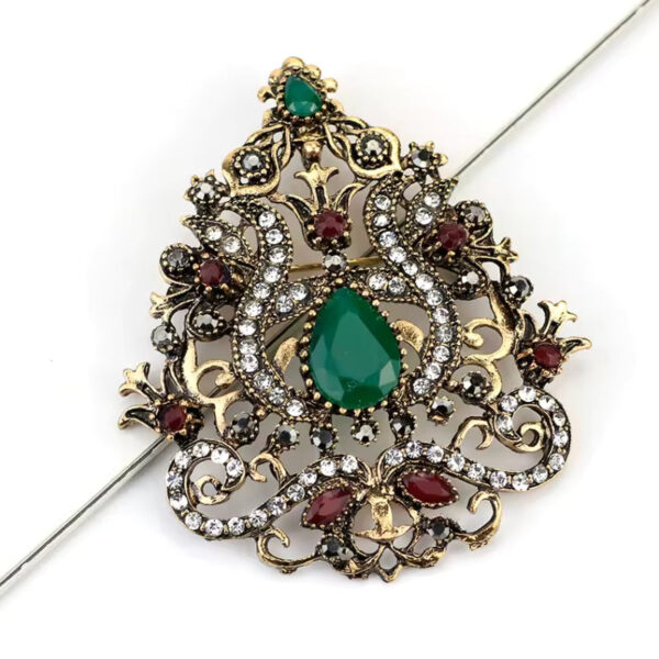 image_233 Antieke broche goddelijk koningschap