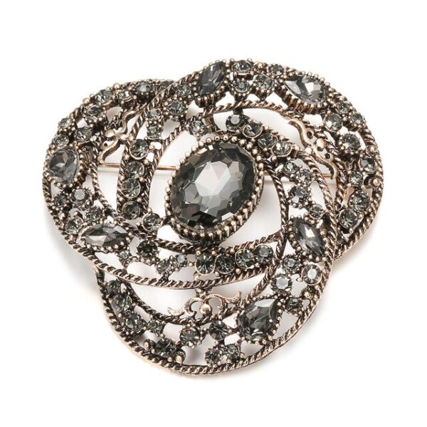 image_402 Antieke broche met gouden lint