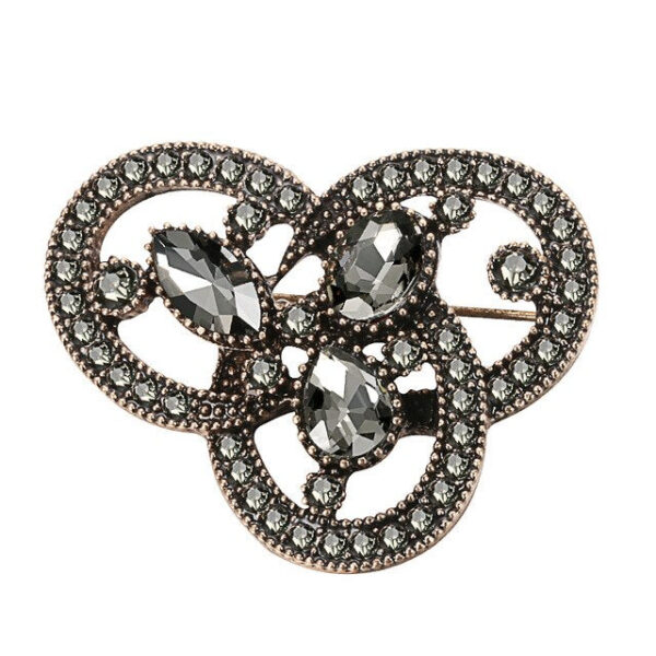 image_439 Oude broche met arabesk